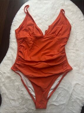 Orange One-Piece Swimsuit with V-Neck and Ruched Sides